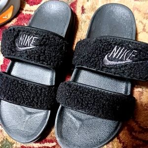 Size 8 womans Nikes and size 8 Grey with a little bit of orange pumas